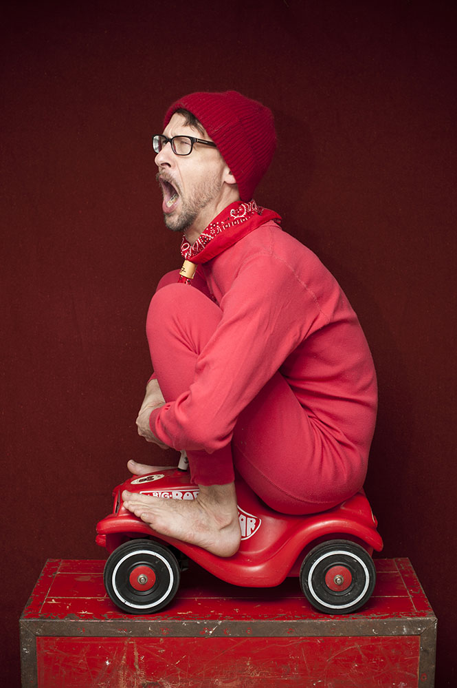 funny creative portrait red car